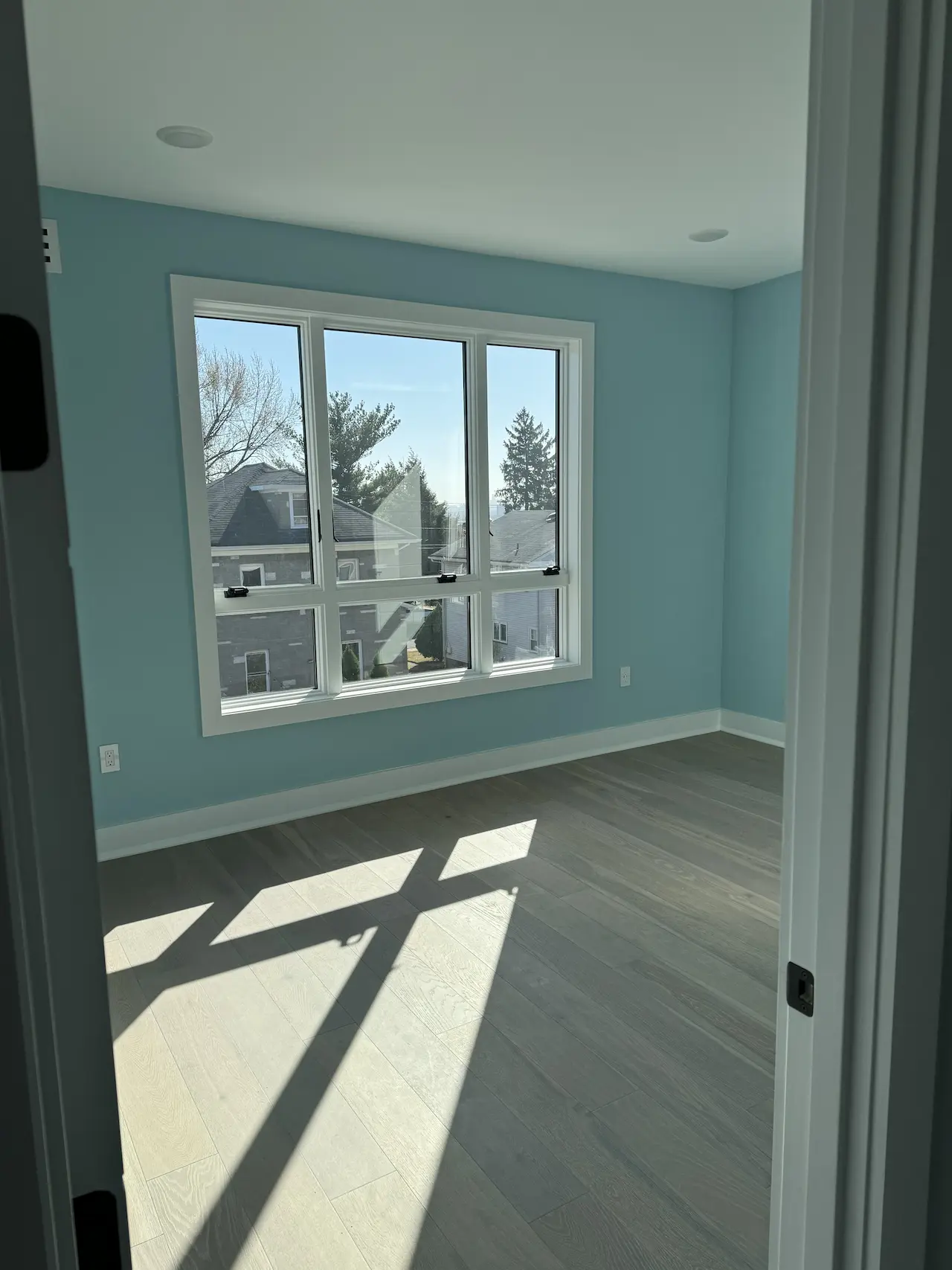 Perfectly smooth matte walls with uniform texture — final result in NYC apartment